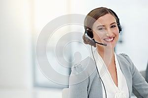 Portrait, consultant and woman with headset in office for career, smile or telemarketing. Professional, business person