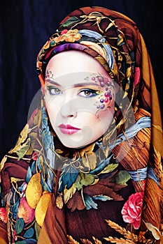 Portrait of contemporary noblewoman with face art creative photo