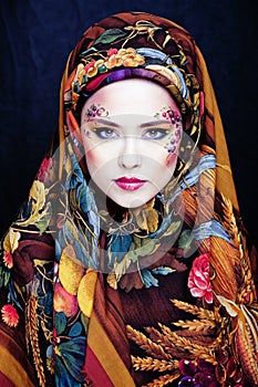 Portrait of contemporary noblewoman with face art creative photo