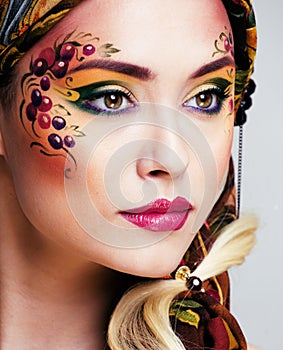Portrait of contemporary noblewoman with face art creative close photo