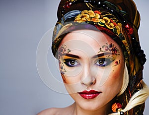 portrait of contemporary noblewoman with face art creative, young retty lady with color berryes on face