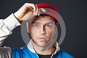 Portrait of cool looking young guy posing in studio.