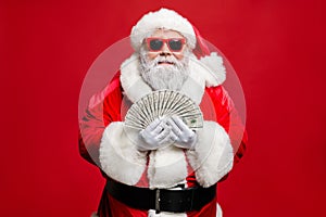 Portrait of cool strylish elderly santa claus hipster millionaire have cash want buy presents spend on winetr season