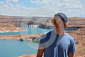 Portrait of cool young man smiling at lake powell