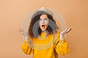 Portrait with copy space for advertisement of shocked afraid woman looking with eyes at empty place having wide open mouth eyes