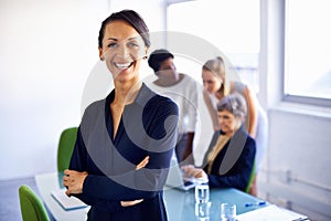 Portrait, corporate and woman with arms crossed, happy and startup with management, teamwork or profit growth. Face