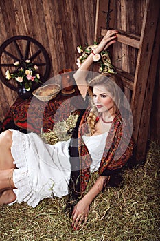 Portrait of countrywoman in rustic style