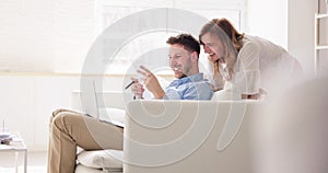 Portrait Of Couple Doing Home Finance