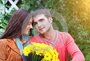 Portrait of couple enjoying golden autumn fall season