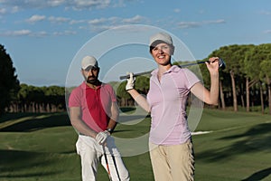 Portrait of couple on golf course