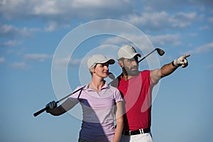 Portrait of couple on golf course