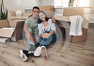 Portrait, couple and happy in new home with boxes for moving in, satisfied and confident with ownership. House