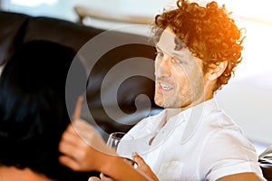 Portrait of a couple having a glass of red wine