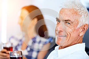 Portrait of a couple having a glass of red wine