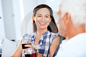 Portrait of a couple having a glass of red wine