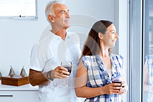 Portrait of a couple having a glass of red wine