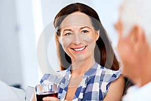 Portrait of a couple having a glass of red wine