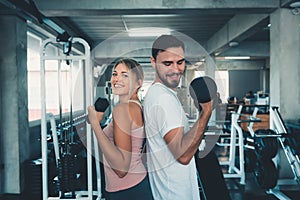 Portrait of Couple Love in Fitness Training With Dumbbell Equipment., Young Couple Caucasian are Working Out and Training Together