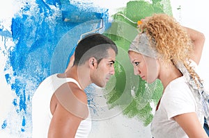 Portrait of couple painting at home