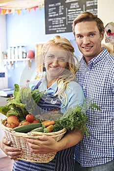 Portrait Of Couple Running Organic Food Shop