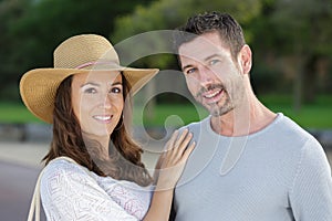 portrait couple in their thirties outdoors