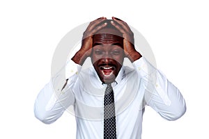 Portrait of a crazy african businessman shouting