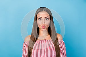 Portrait of crazy girl send funny air kiss wear good look shirt isolated over blue color background