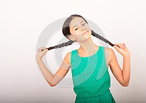 Portrait of crazy pretty girl holding braids