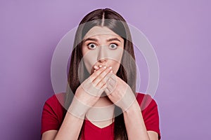 Portrait of crazy voiceless stunned lady crossed hands cover mouth look camera on violet background