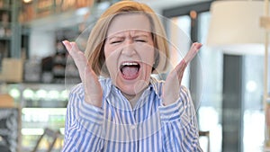 Portrait of Creative Old Woman Shouting, Screaming