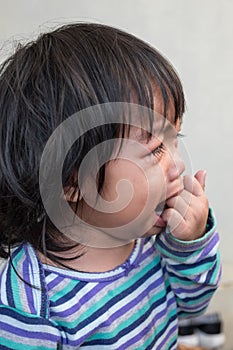 Portrait of crying baby girl