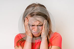 Portrait of a crying woman with bruised skin and black eyes