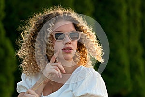 Portrait curly girl outdoors