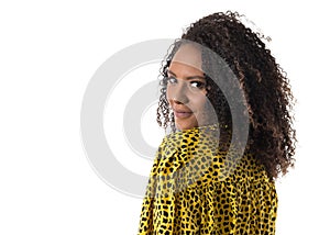 Portrait of curly hair brazilian woman feeling happy and carefree. Isolated on white background