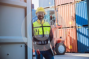 Portrait custom staff worker happy smile working in cargo shipping logistic port
