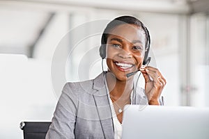 Portrait of customer service woman working on call center