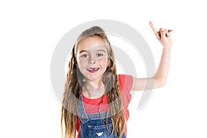 Portrait of a cute 7 years old girl Isolated over white background pensive