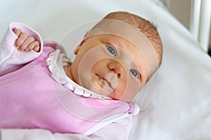 Portrait of cute adorable newborn baby girl.