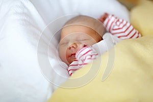 Portrait of cute adorable newborn baby girl sleeping