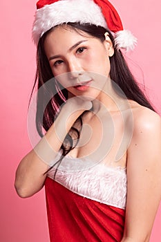 Portrait of cute Asian Christmas Santa Claus girl