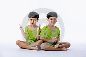 Portrait of cute Asian twins boys. two little boys twins isolated on white background. twins boys fun together on white background