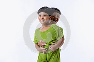 Portrait of cute Asian twins boys. two little boys twins isolated on white background. twins boys fun together on white background