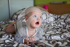 Portrait of cute baby boy with Down syndrome