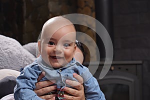 Portrait of cute baby boy smiling at home