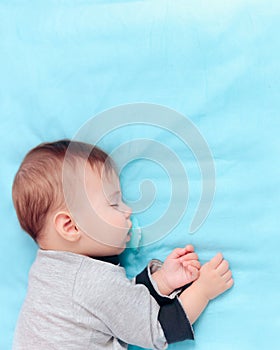 Portrait of a Cute Baby Sleeping and Dreaming