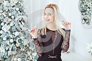 Portrait of a cute blonde with bitcoins