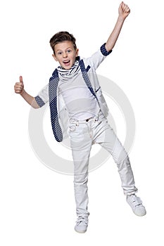 Portrait of cute boy, posing against white background
