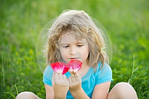 Portrait of a cute child boy. Close up caucasian kids face. Kids enjoying summer.