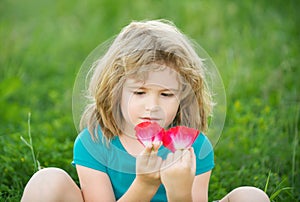 Portrait of a cute child boy. Close up caucasian kids face. Kids enjoying summer.