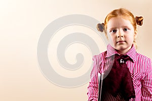 Portrait of cute elegant redhead girl